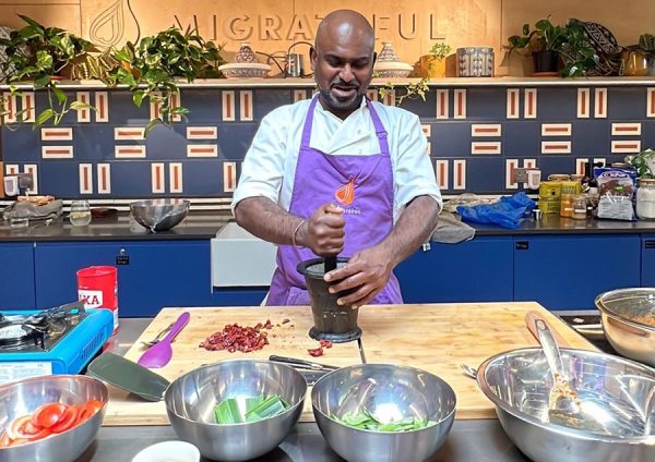 Image of Yogi preparing food.