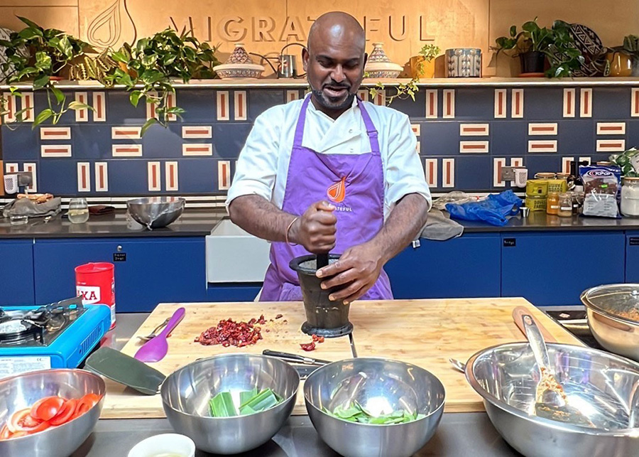 Image of Yogi preparing food.